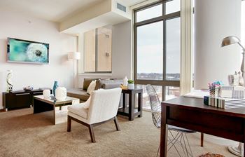 High ceilings with floor-to-ceiling windows*